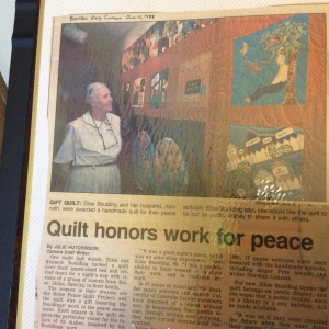 Elise Boulding with Peace Quilt made for her.